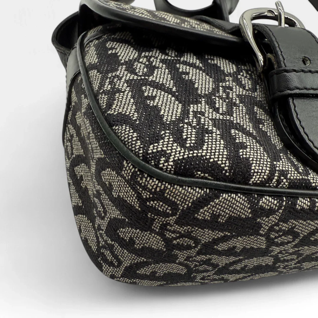 https://cdn.shopify.com/s/files/1/0564/9376/8855/files/Dior_Umhangetasche_mit_Schnallen_monogram_beige___schwarz_vintage_designer_crossbody7317.webp?v=1756379694