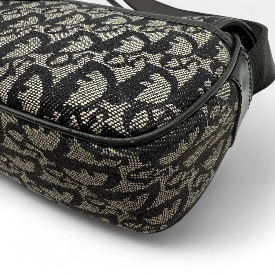 https://cdn.shopify.com/s/files/1/0564/9376/8855/files/Dior_Umhangetasche_mit_Schnallen_monogram_beige___schwarz_vintage_designer_crossbody7320.webp?v=1756379694