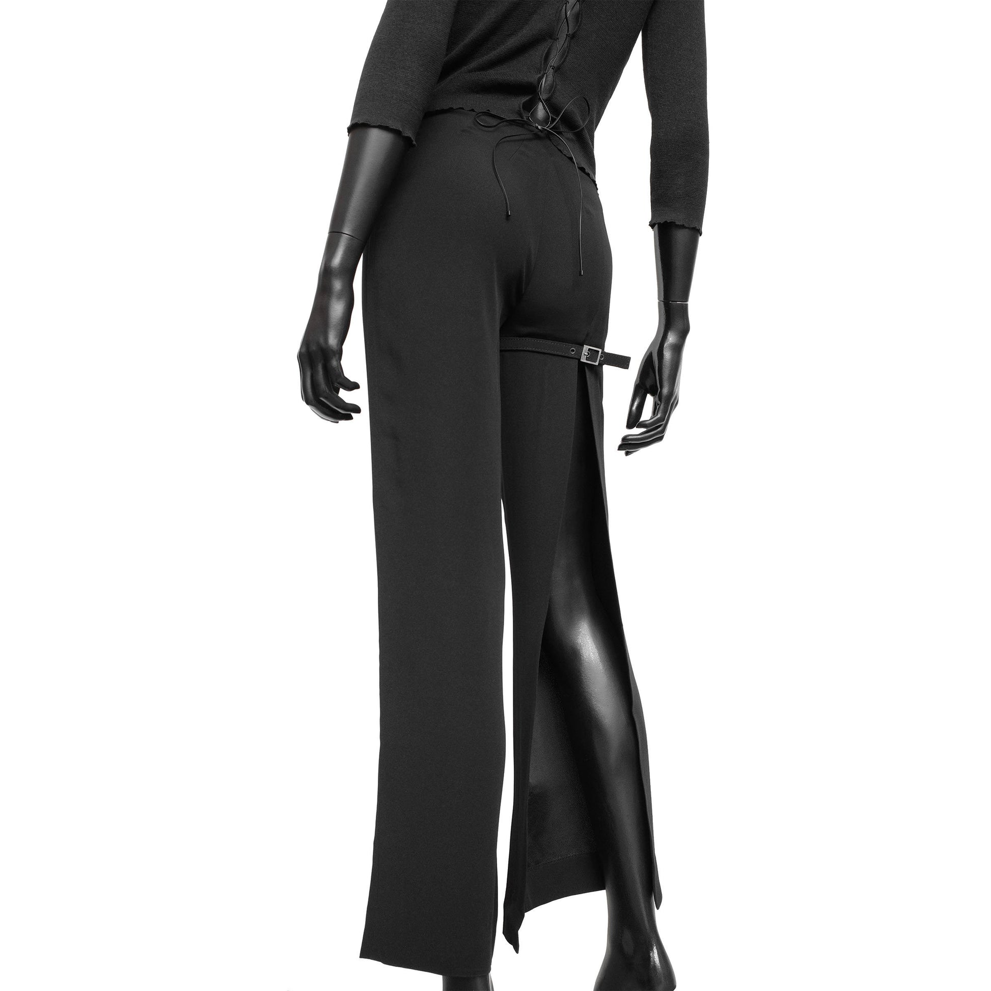 Dirk Bikkembergs SS 1997 tailored trousers with a buckle belt and back slit on the right leg. Size IT 38 / XS. Available at Artefact Archive.