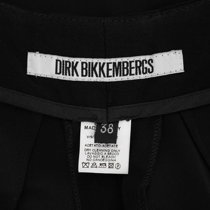 Dirk Bikkembergs SS 1997 tailored trousers with a buckle belt and back slit on the right leg. Size IT 38 / XS. Available at Artefact Archive.