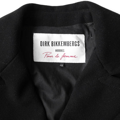 https://images.squarespace-cdn.com/content/v1/673cad159307f210013ba2f7/60c6fd4e-9670-401a-b031-0ea0c30dd547/DirkBikkembergs_Fall1996_LeatherWoolBungeeCordCoat_4.jpg