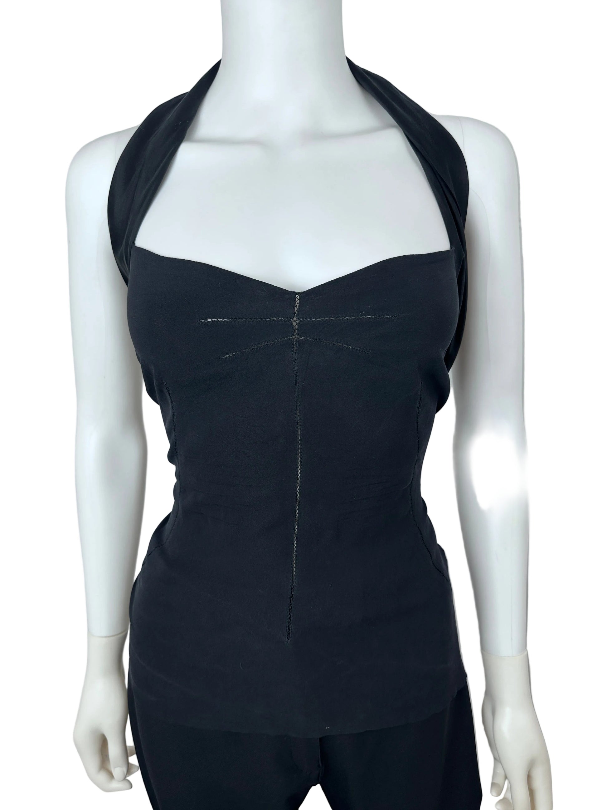 A black sleeveless fitted dress displayed on a white mannequin against a light gray background.