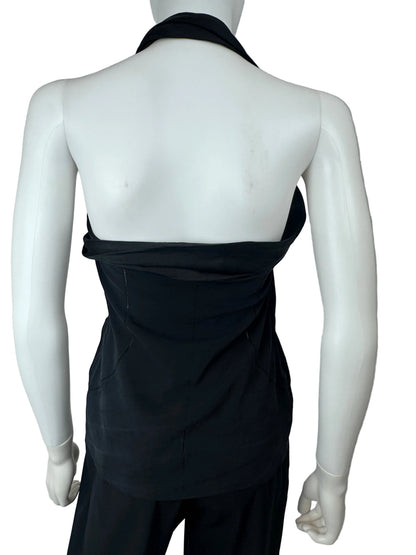 A black strapless draped top or dress displayed on a white mannequin torso, photographed against a plain light gray background.
