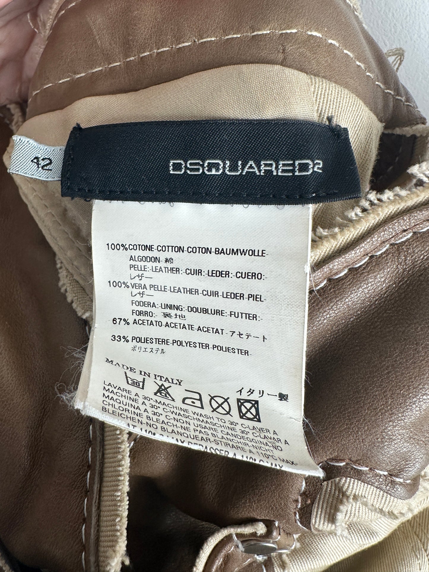 https://cdn.shopify.com/s/files/1/0900/2729/5066/files/Dsquared_s_s_2006_western_dress_label.jpg?v=1773939809