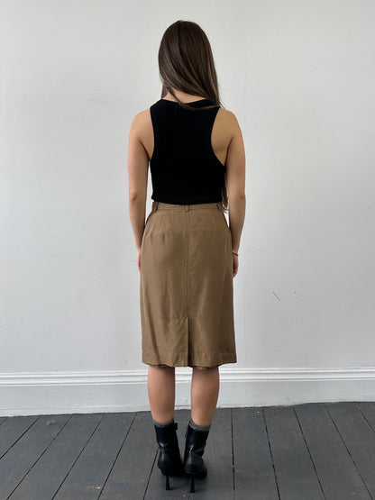 Jaeger pure silk button-down midi skirt in W24, featuring a sleek, flowing design with a classic button-front detail.