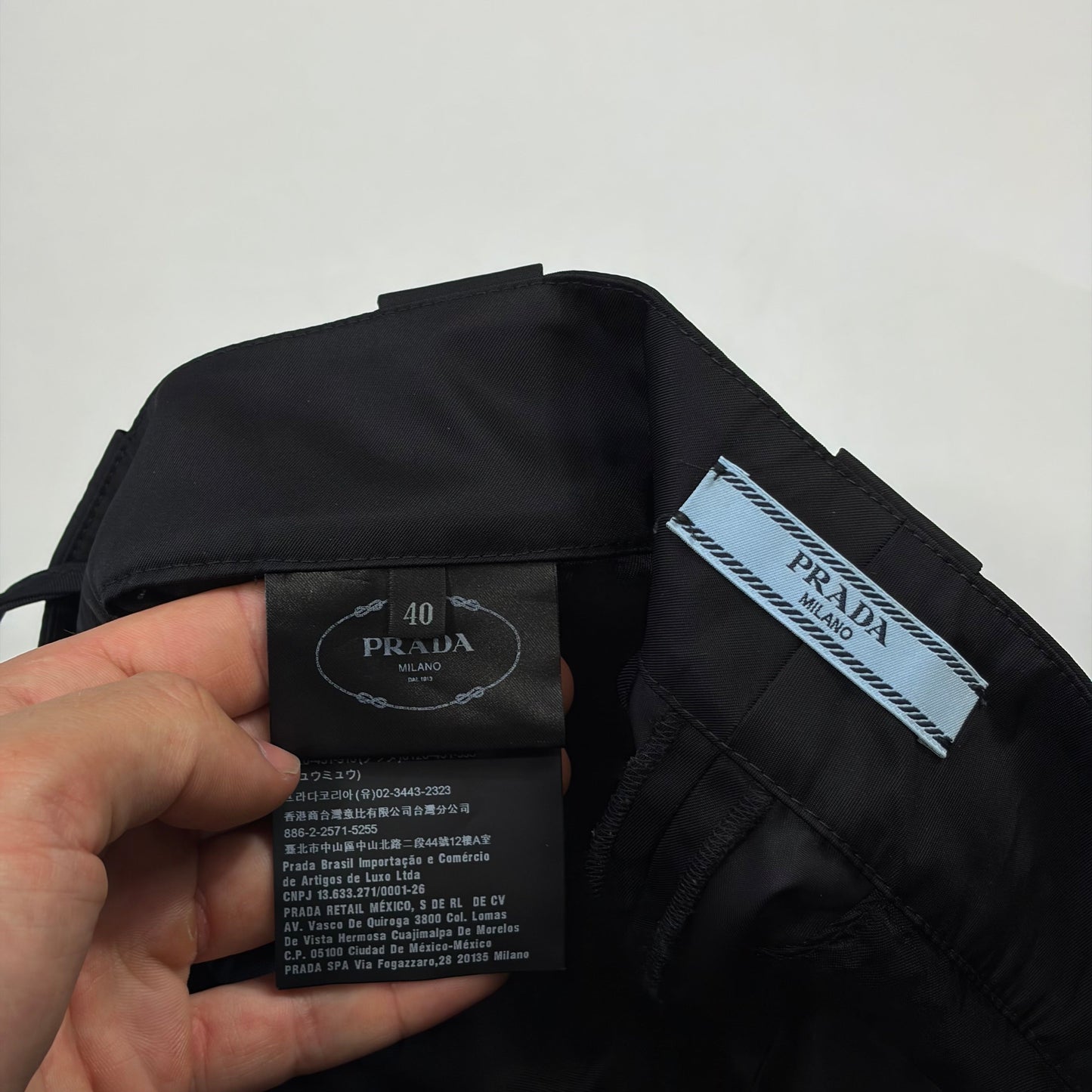 Prada Milano 2018 Black Nylon Gabardine Triangle Logo Trousers - IT40 | O/S, Black