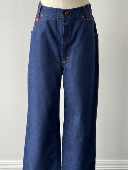 Vintage Italian 1990s straight-leg high-waisted denim jeans, W28, with classic blue wash and vintage stitching details.