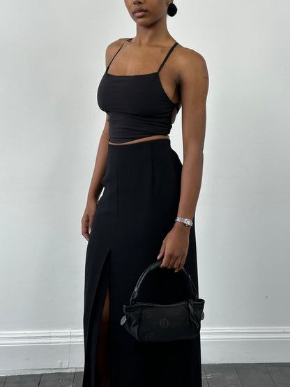 Jaeger 1990s pure wool side split maxi skirt in neutral color, featuring a flowing design and side slit detail.
