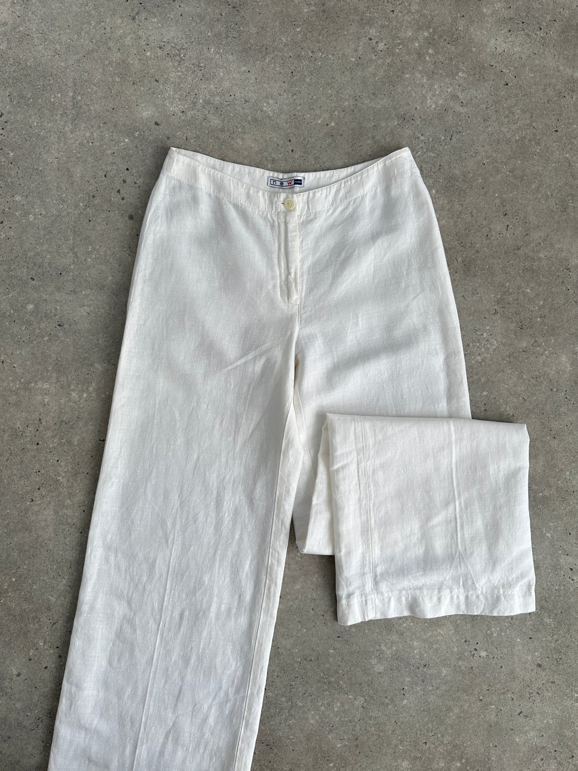 Vintage pure linen low waist wide-leg trousers in natural fabric, featuring a relaxed fit and classic style.