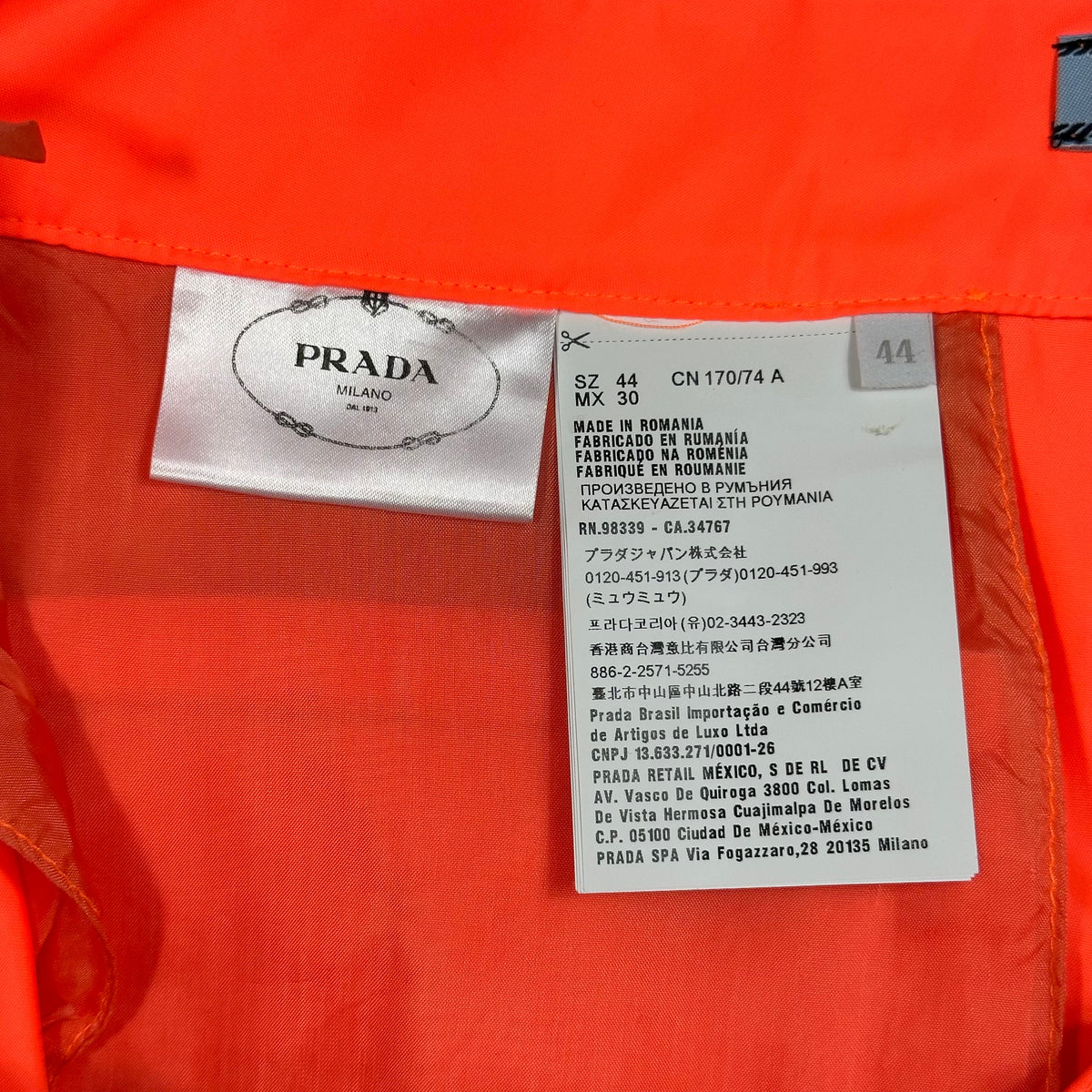 Prada Milano 2018 Orange Nylon Gabardine Triangle Logo Trousers - S/M | Small, Orange
