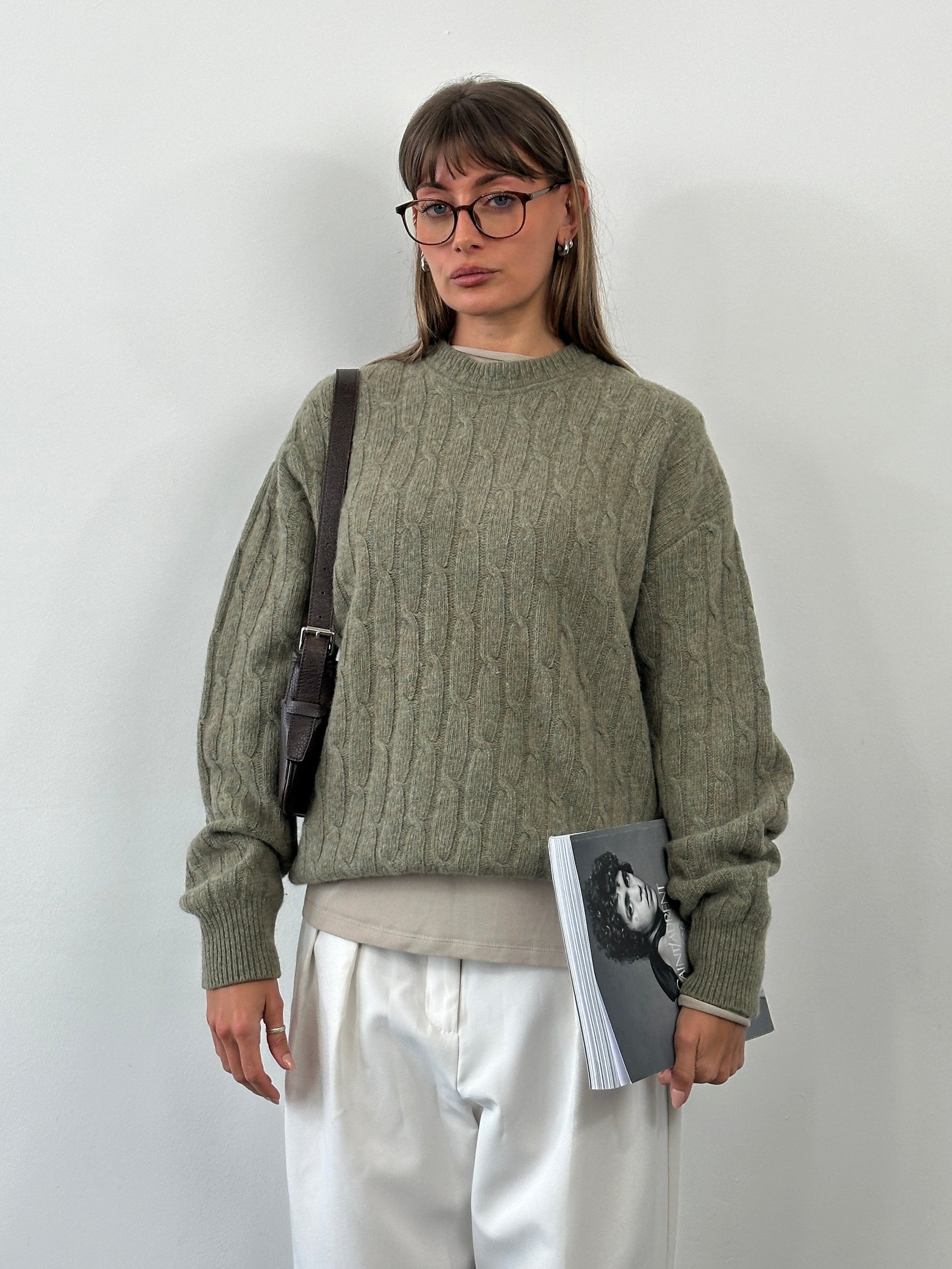 Vintage Italian 1990s wool knitted jumper in XL, showcasing a cozy, textured knit with a classic retro design.
