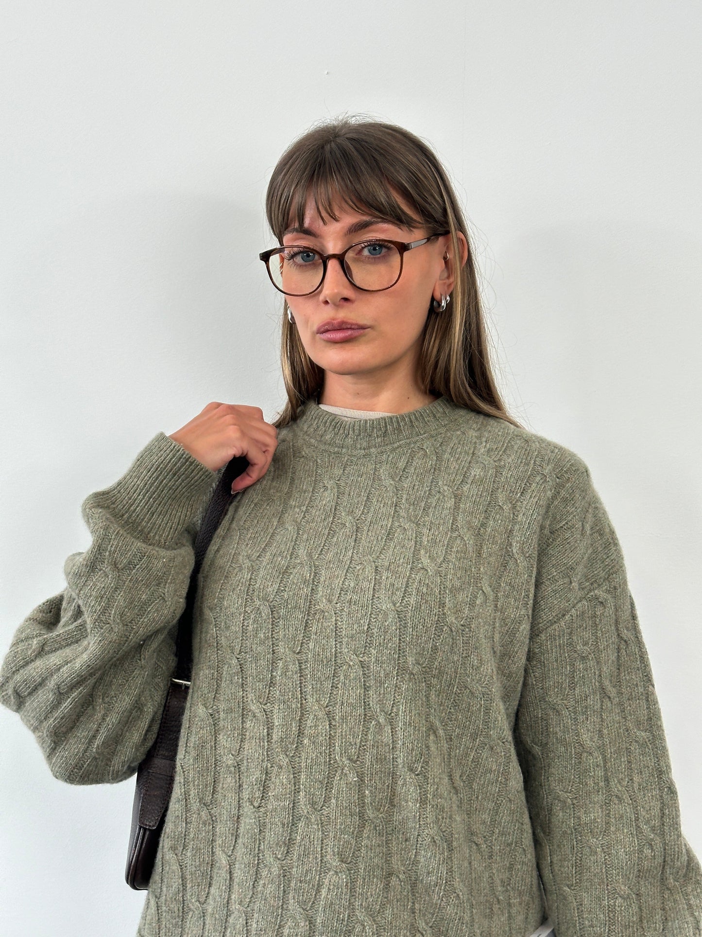 Vintage 1990s Italian wool knitted jumper in XL, featuring a cozy, textured knit pattern and classic design.