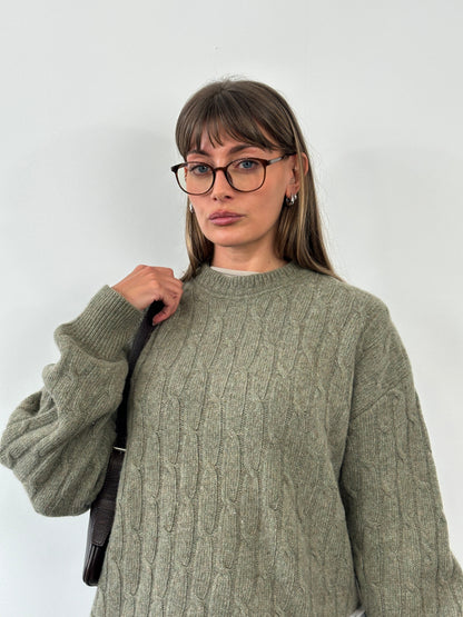 Vintage 1990s Italian wool knitted jumper in XL, featuring a cozy, textured knit pattern and classic design.