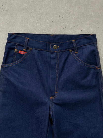 Vintage Italian 1990s high-waisted straight leg denim jeans, size W28, showcasing classic vintage style and light blue denim fabric.