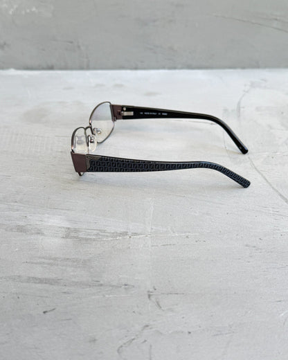Fendi Clear Lens Silver Frame Glasses-on a concrete background