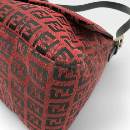 https://cdn.shopify.com/s/files/1/0564/9376/8855/files/Fendi_Handtasche_Mamma_Baguette_aus_Stoff_monogram_rot_vintage_luxury_FF_handbag_8670.webp?v=1741956508