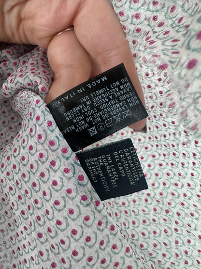 Close up of a care label on a silk gaarment