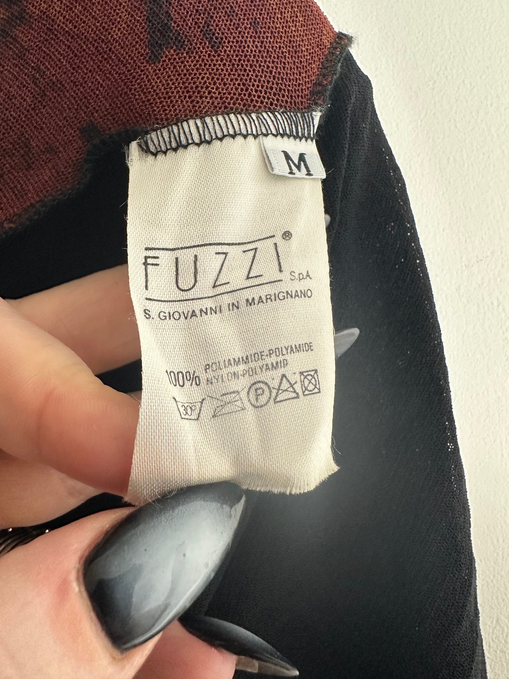 https://cdn.shopify.com/s/files/1/0900/2729/5066/files/Fuzzi_Care_Label.heic?v=1768499168
