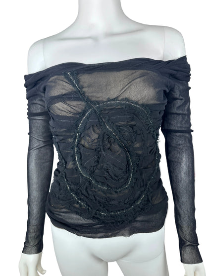 Black sheer top on a mannequin with a white background