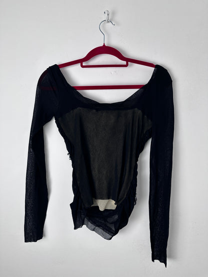 Black top on a red hanger against a white background