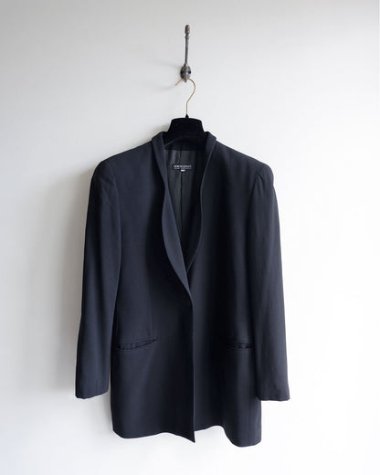 https://images.squarespace-cdn.com/content/v1/5b579b7b70e8025a5b246025/feae33ac-4dda-480b-86b8-5f0844a7aa2d/GAsuitblk5.jpg