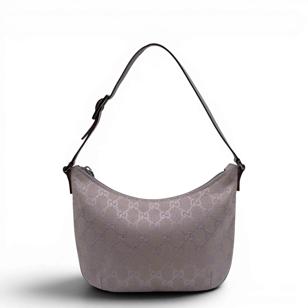 https://cdn.shopify.com/s/files/1/0564/9376/8855/files/GucciPochetteCroissantmonogramsilber7334.webp?v=1778681229
