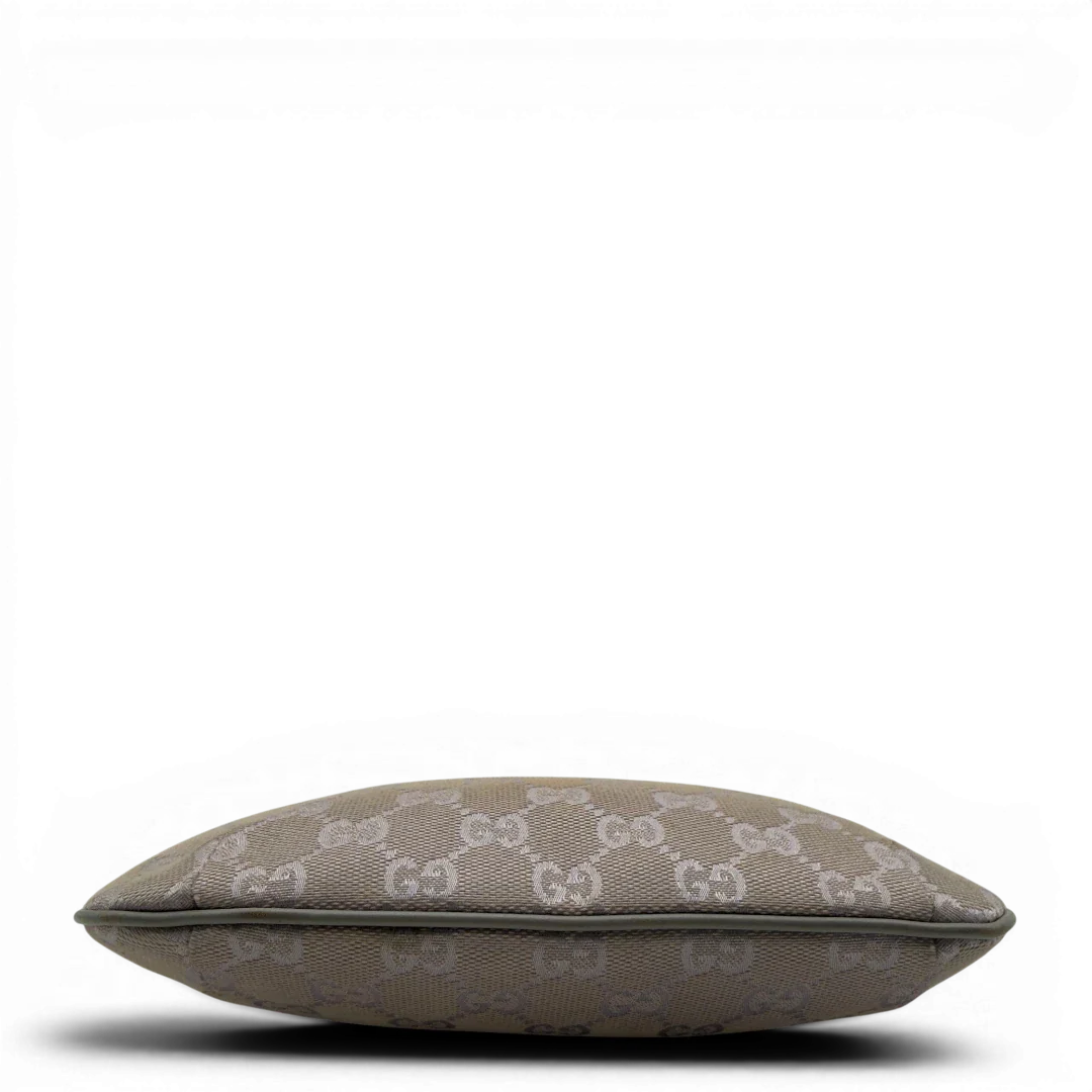 https://cdn.shopify.com/s/files/1/0564/9376/8855/files/GucciPochetteCroissantmonogramsilber7340.webp?v=1778681229