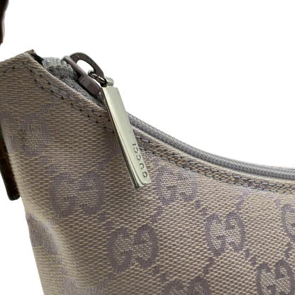 https://cdn.shopify.com/s/files/1/0564/9376/8855/files/GucciPochetteCroissantmonogramsilber7346.webp?v=1778681230