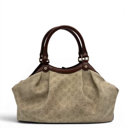 https://cdn.shopify.com/s/files/1/0564/9376/8855/files/GucciShopperSukeymonogrambeige7622.webp?v=1779408182