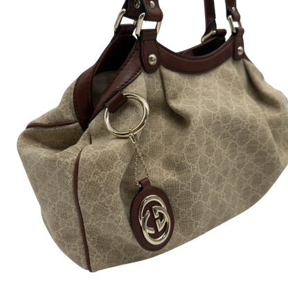 https://cdn.shopify.com/s/files/1/0564/9376/8855/files/GucciShopperSukeymonogrambeige7633.webp?v=1779408182