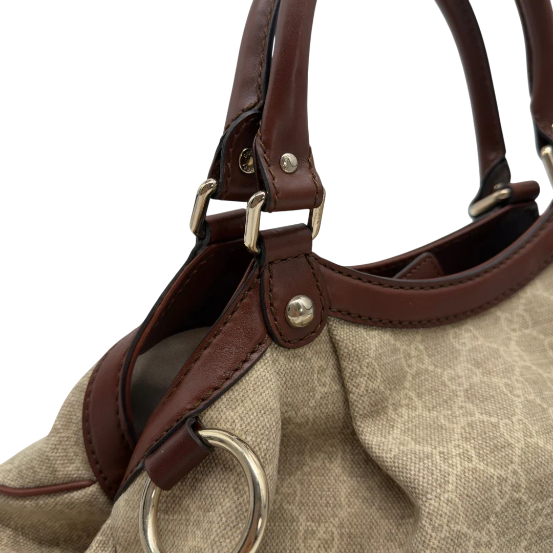 https://cdn.shopify.com/s/files/1/0564/9376/8855/files/GucciShopperSukeymonogrambeige7634.webp?v=1779408182