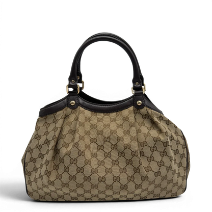 https://cdn.shopify.com/s/files/1/0564/9376/8855/files/GucciShopperSukeymonogrambeige7646.webp?v=1779408085