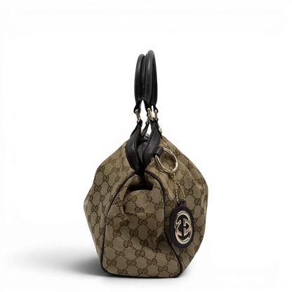 https://cdn.shopify.com/s/files/1/0564/9376/8855/files/GucciShopperSukeymonogrambeige7647.webp?v=1779408084