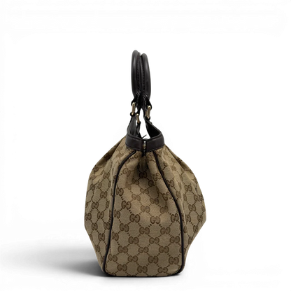 https://cdn.shopify.com/s/files/1/0564/9376/8855/files/GucciShopperSukeymonogrambeige7648.webp?v=1779408084