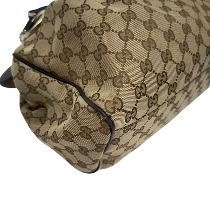 https://cdn.shopify.com/s/files/1/0564/9376/8855/files/GucciShopperSukeymonogrambeige7651.webp?v=1779408085
