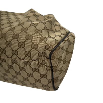 https://cdn.shopify.com/s/files/1/0564/9376/8855/files/GucciShopperSukeymonogrambeige7652.webp?v=1779408085