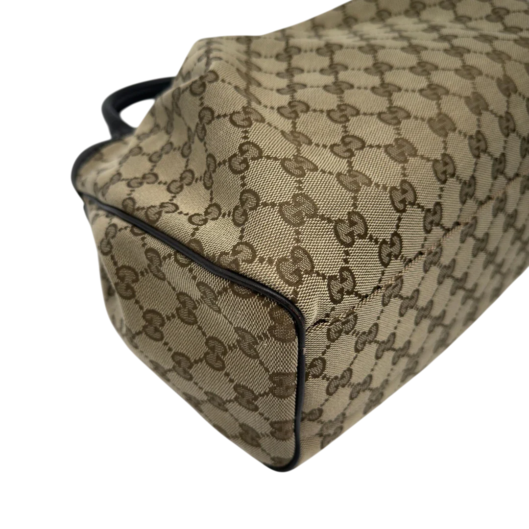 https://cdn.shopify.com/s/files/1/0564/9376/8855/files/GucciShopperSukeymonogrambeige7653.webp?v=1779408085