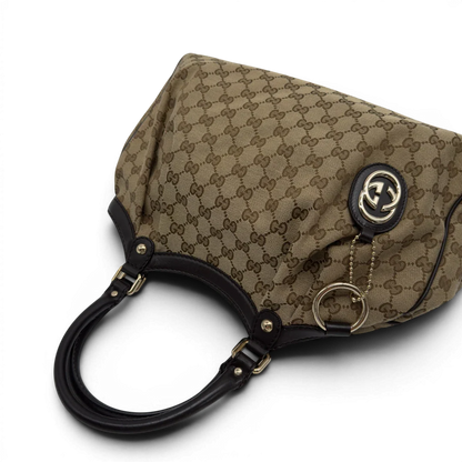 https://cdn.shopify.com/s/files/1/0564/9376/8855/files/GucciShopperSukeymonogrambeige7654.webp?v=1779408085