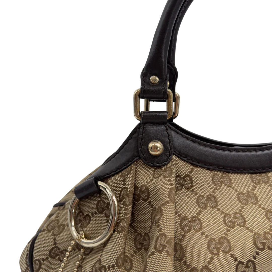 https://cdn.shopify.com/s/files/1/0564/9376/8855/files/GucciShopperSukeymonogrambeige7656.webp?v=1779408085