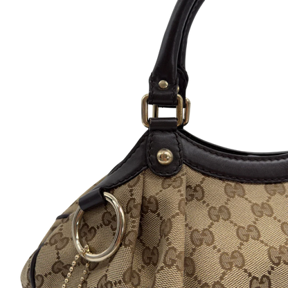 https://cdn.shopify.com/s/files/1/0564/9376/8855/files/GucciShopperSukeymonogrambeige7656.webp?v=1779408085
