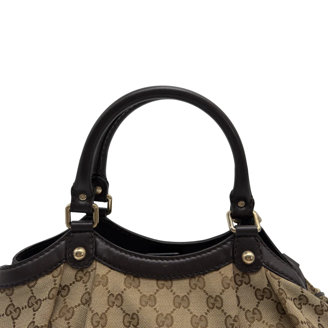 https://cdn.shopify.com/s/files/1/0564/9376/8855/files/GucciShopperSukeymonogrambeige7658.webp?v=1779408085
