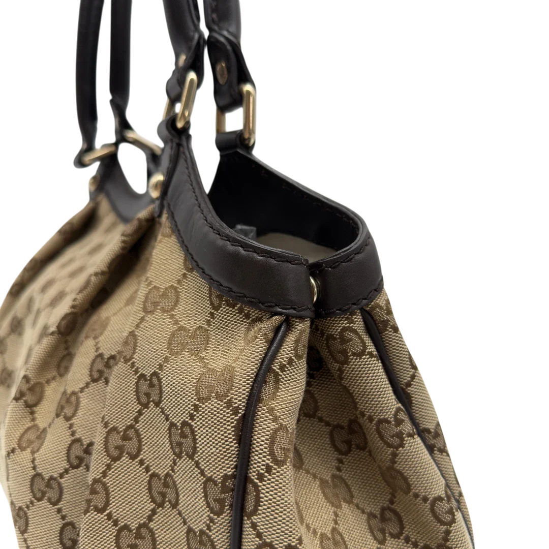 https://cdn.shopify.com/s/files/1/0564/9376/8855/files/GucciShopperSukeymonogrambeige7659.webp?v=1779408085