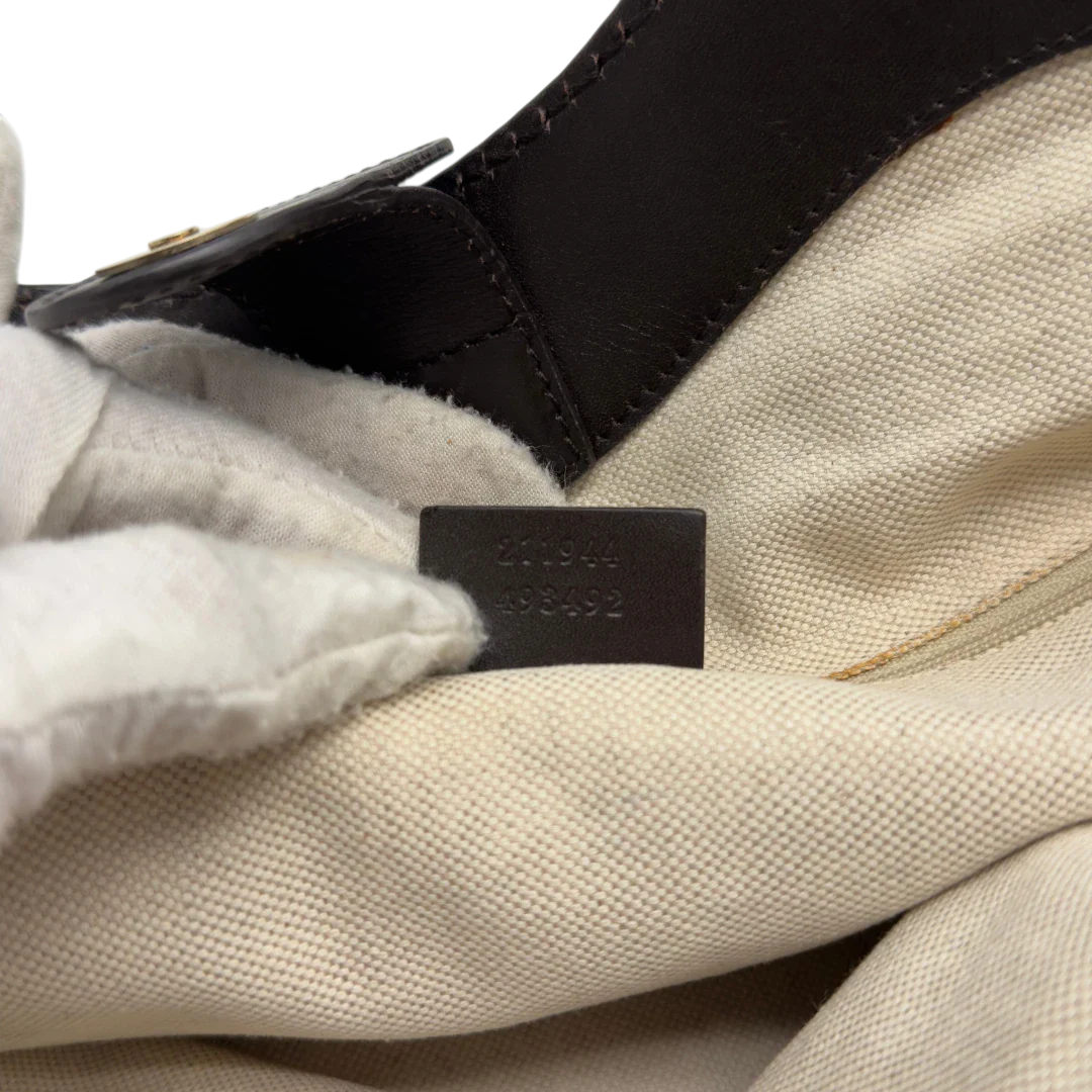 https://cdn.shopify.com/s/files/1/0564/9376/8855/files/GucciShopperSukeymonogrambeige7662.webp?v=1779408085