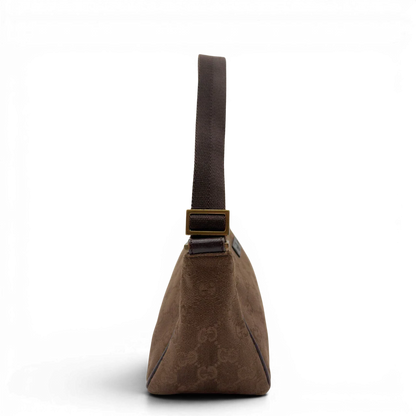 https://cdn.shopify.com/s/files/1/0564/9376/8855/files/Gucci_Baguette_Bag_aus_Canvas_braun_vintage_GG6972.webp?v=1778198783