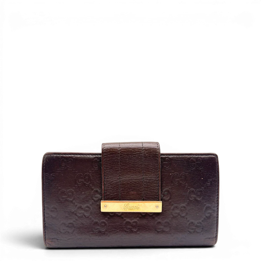 https://cdn.shopify.com/s/files/1/0564/9376/8855/files/Gucci_Geldbeutel_Bifold_langlich_aus_Leder_monogram_dunkelbraun_1.webp?v=1784242159