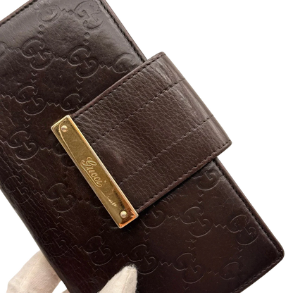 https://cdn.shopify.com/s/files/1/0564/9376/8855/files/Gucci_Geldbeutel_Bifold_langlich_aus_Leder_monogram_dunkelbraun_10.webp?v=1784242159