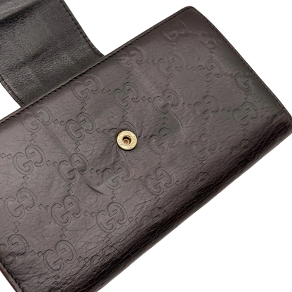 https://cdn.shopify.com/s/files/1/0564/9376/8855/files/Gucci_Geldbeutel_Bifold_langlich_aus_Leder_monogram_dunkelbraun_13.webp?v=1784242159