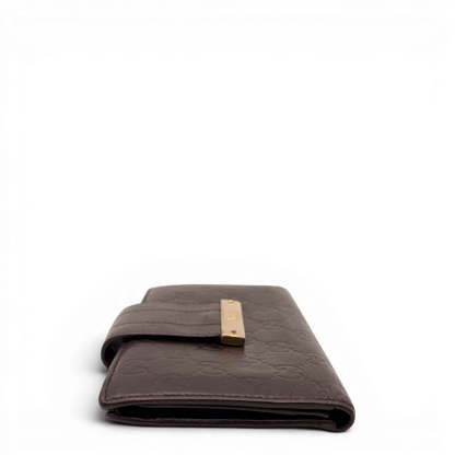 https://cdn.shopify.com/s/files/1/0564/9376/8855/files/Gucci_Geldbeutel_Bifold_langlich_aus_Leder_monogram_dunkelbraun_3.webp?v=1784242158