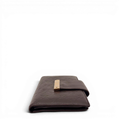 https://cdn.shopify.com/s/files/1/0564/9376/8855/files/Gucci_Geldbeutel_Bifold_langlich_aus_Leder_monogram_dunkelbraun_4.webp?v=1784242158