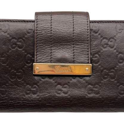 https://cdn.shopify.com/s/files/1/0564/9376/8855/files/Gucci_Geldbeutel_Bifold_langlich_aus_Leder_monogram_dunkelbraun_6.webp?v=1784242159